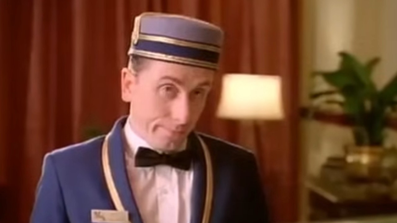 Tim Roth in a bellhop outfit in Four Rooms