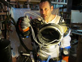 Cameron Smith, a Portland State University anthropologist, in a spacesuit he is designing. Smith is also examining the matter of evolution during long-term space missions.