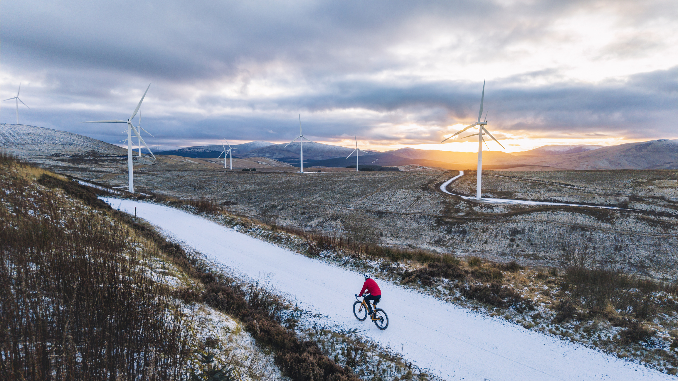 Cyclist on snowy road