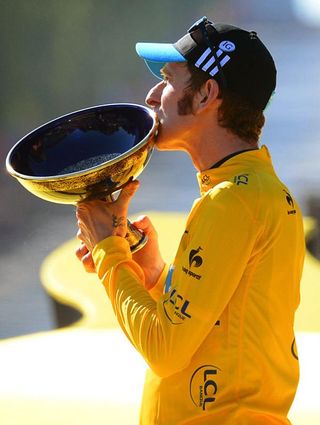 2012 Tour de France champion Bradley Wiggins (Sky) with the winner's trophy.