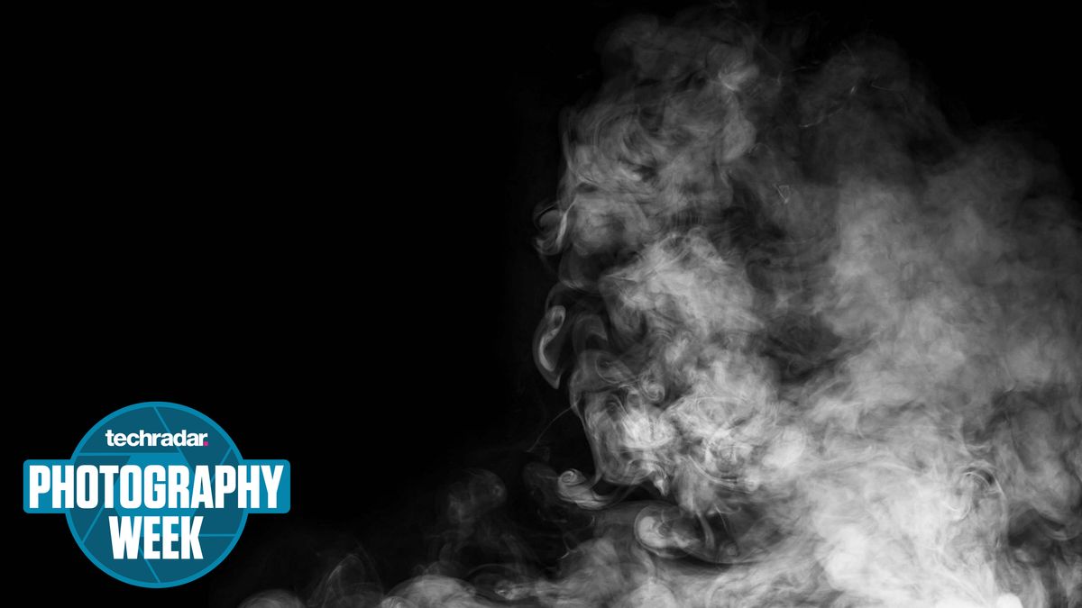 Smoke rising on a black background