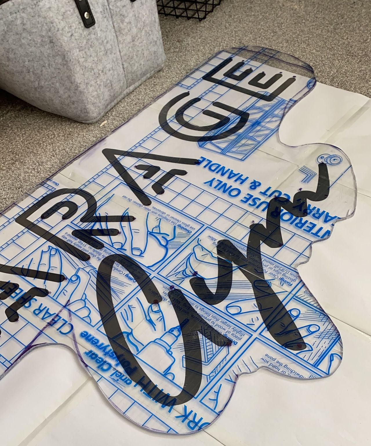 Neon rope sign made by Jasmine Guerney with clear perspex sheet acrylic material and adhesive backing