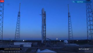 A SpaceX Falcon 9 rocket stands atop the launch pad ready to launch the DSCOVR space weather satellite from Cape Canaveral Air Force Station on Feb. 8, 2015. The launch was delayed to a ground radar malfunction.