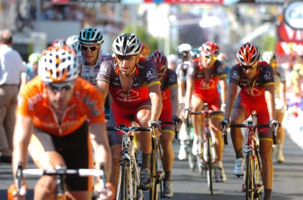 Lance Armstrong (RadioShack) and some of his teammates cross the line.