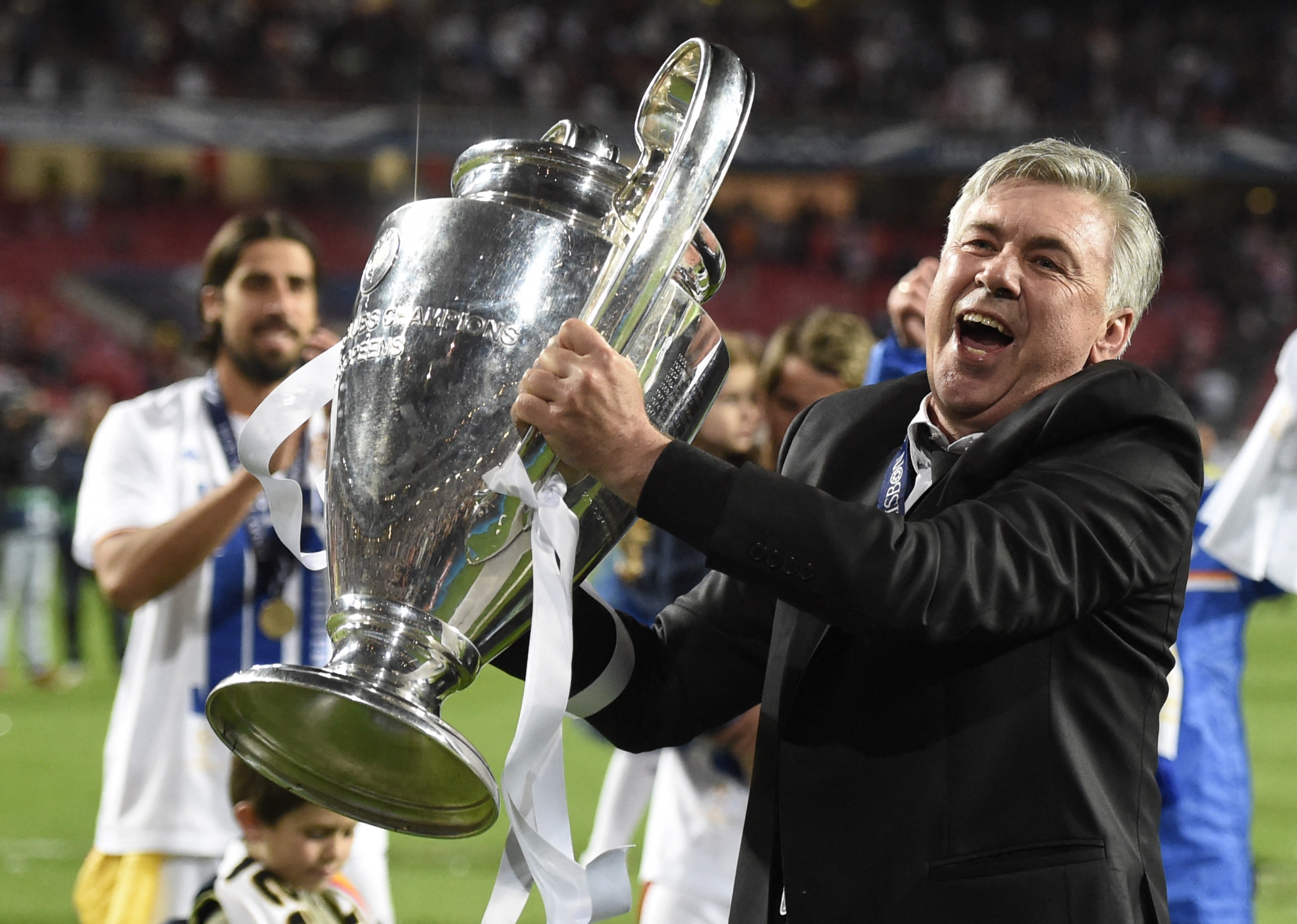Carlo Ancelotti celebrates with the Champions League trophy after Real Madrid's win over Atletico Madrid in the final in May 2014.