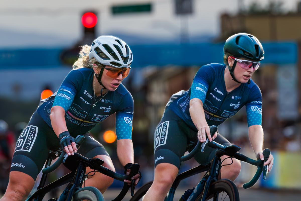 Anna Hicks (left) covered moves in the Littleton Twilight Criterium as teammate Olivia Cummins sprinted to the victory