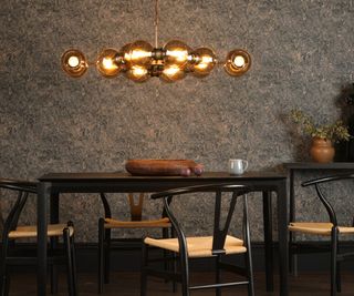 Glass circle lamp, black dining table and chairs