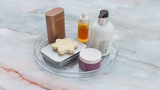 clean decluttered bathroom with toiletries arranged on a tray
