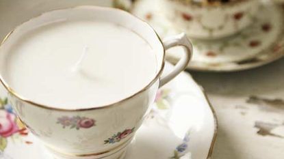 white colour teacups candle