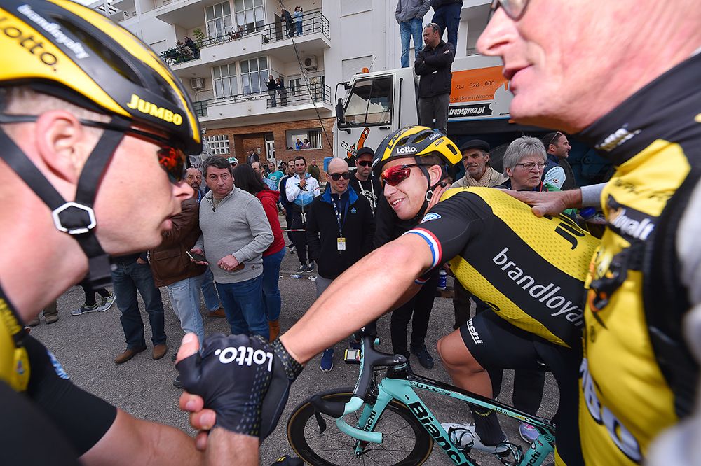 Teammates congratulate Dylan Groenewegen after he won stage 4 at Volta ao Algarve