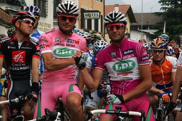 LPR teammates Danilo Di Lucaand Alessandro Petacchi in their respective jerseys for leading the general and points classifications.