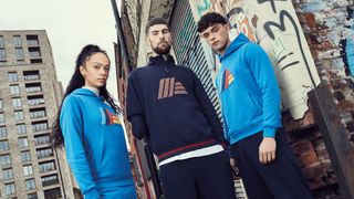 three people wearing Aldidas branded hoodies