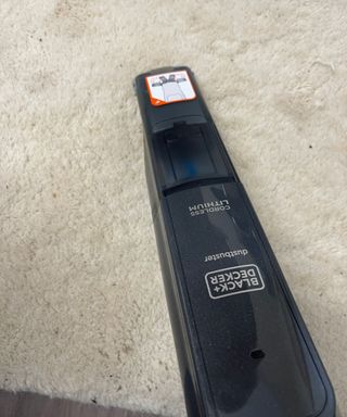 Black+Decker 12V MAX Dustbuster vacuuming dirty carpet (1)