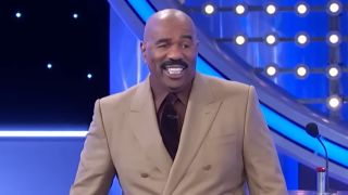 Steve Harvey big smile on Family Feud