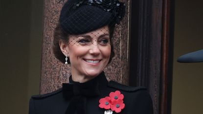 The Princess of Wales stands on the Buckingham Palace balcony during the Remembrance Day events