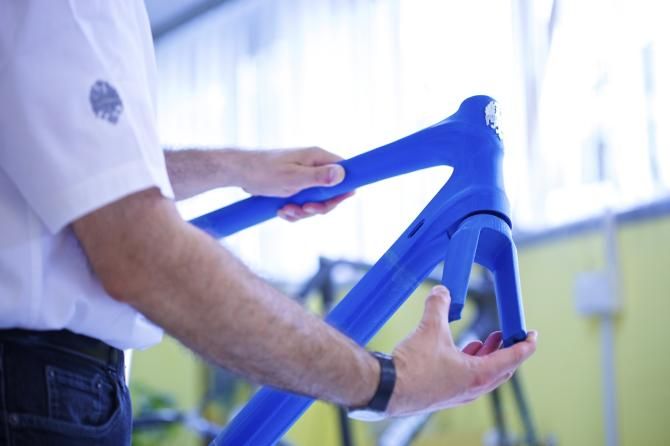 A Bianchi designer with the resin prototype