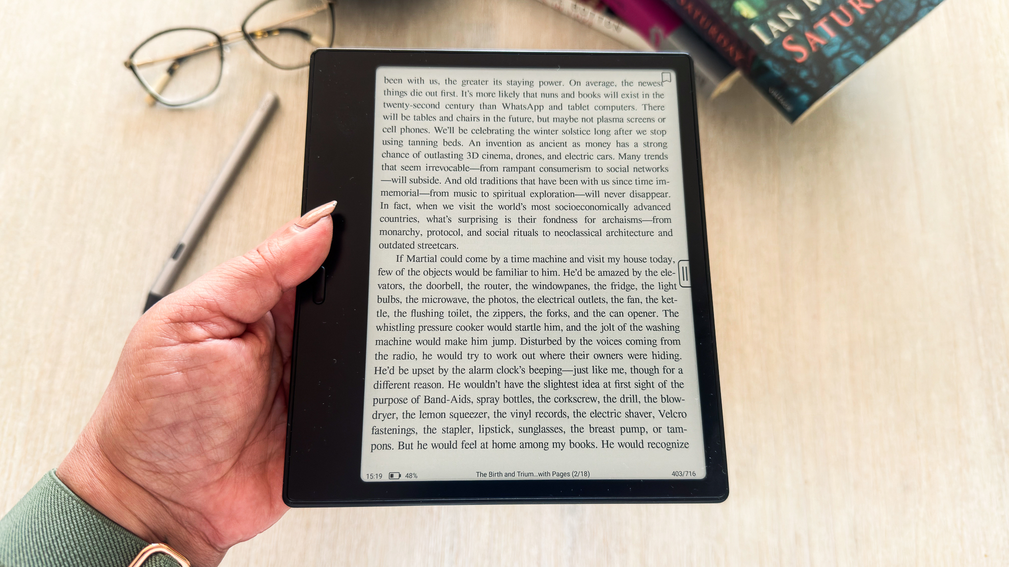 A person holding the Boox Go 7 ereader