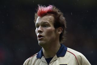 Freddie Ljungberg looks on while playing for Arsenal against Aston Villa, 2002