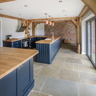 kitchen with flagstone floor hanging light