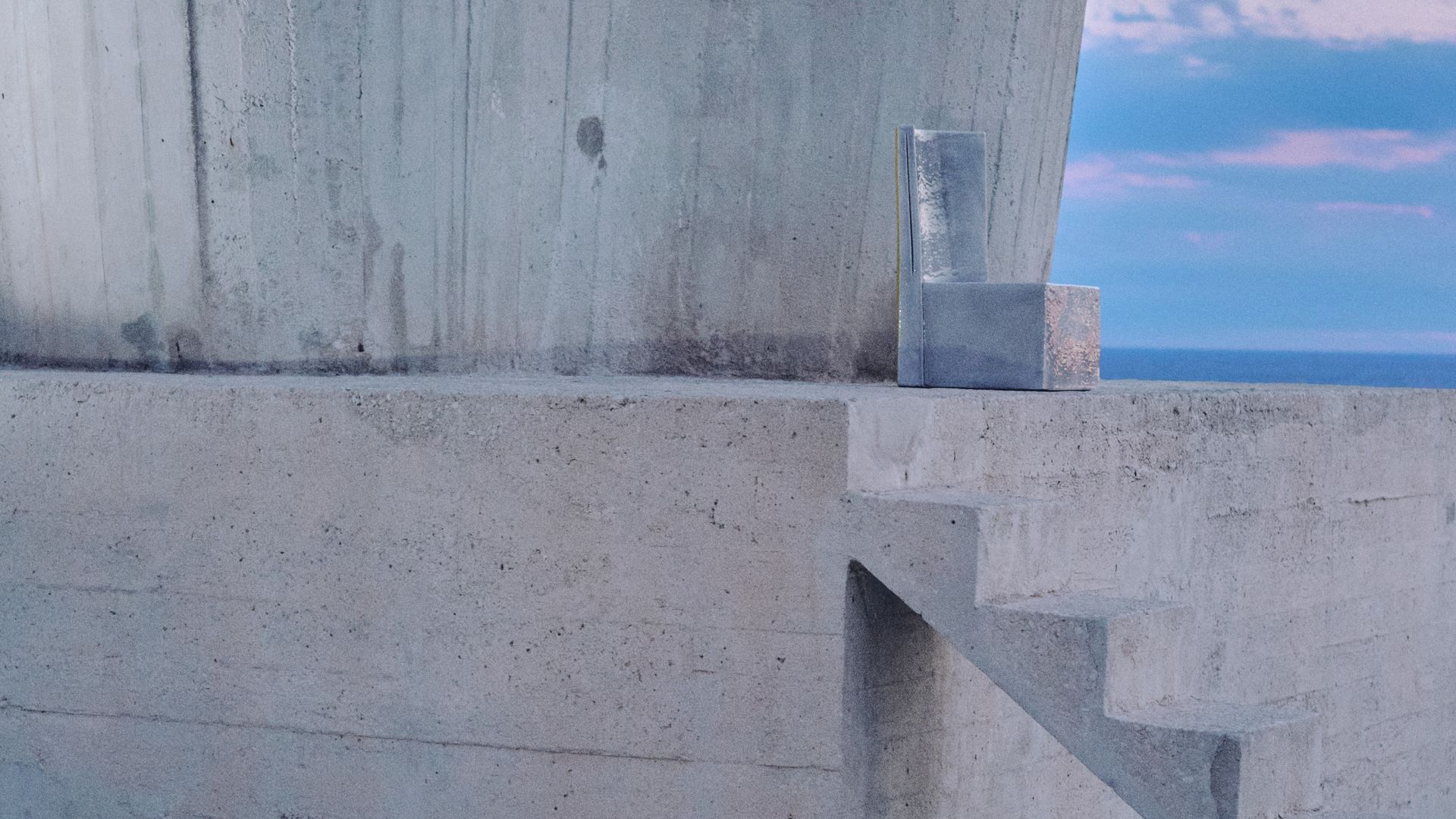 brutalist rooftop with chair