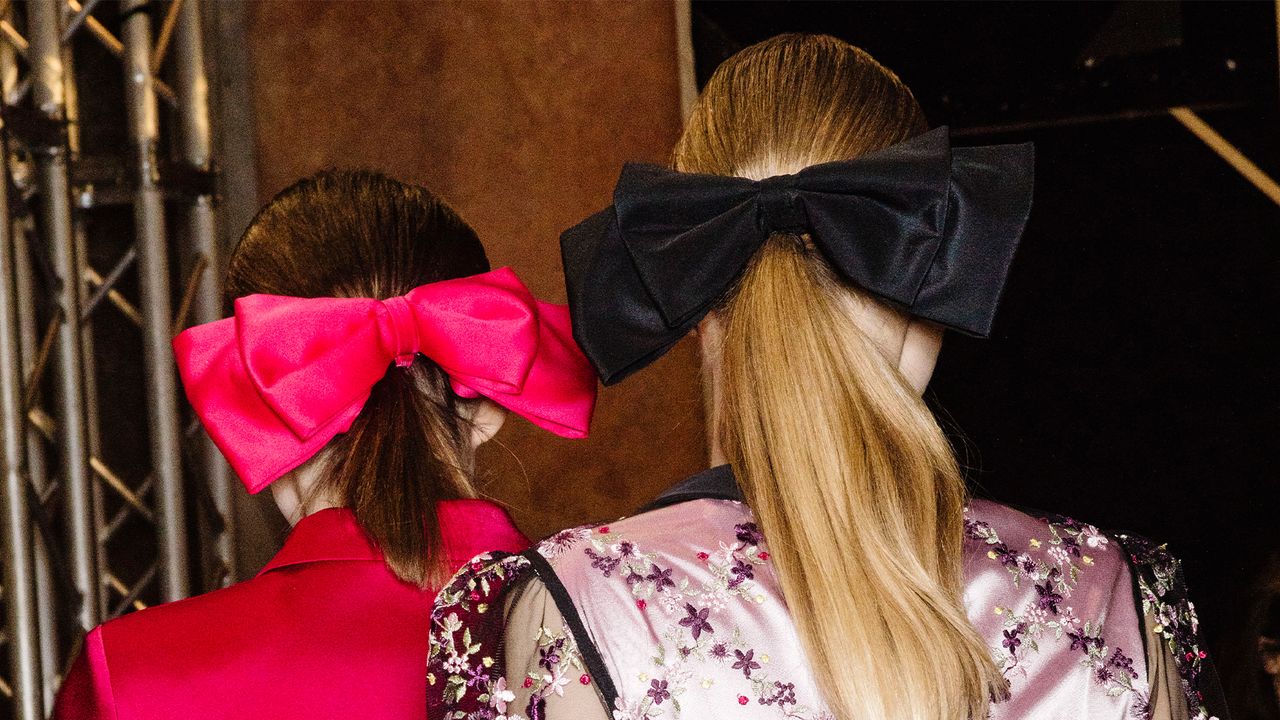 MILAN, ITALY - FEBRUARY 25: Models, hair detail, are seen backstage ahead of the Piccione.Piccione show during Milan Fashion Week Fall/Winter 2018/19 on February 25, 2018 in Milan, Italy. (Photo by Rosdiana Ciaravolo/Getty Images)