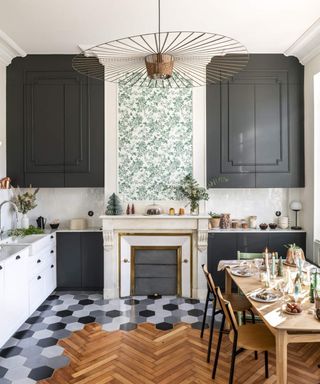 A modern kitchen with hexagonal grey and wooden statement flooring