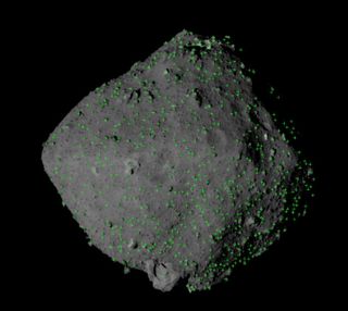 The distribution of rocks on the surface of asteroid Ryugu — green marks indicate a rock that seems to be more than 25 feet (8 meters) across.