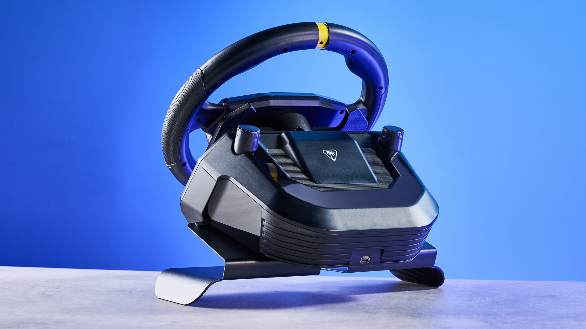 A black Turtle Beach Racer Wireless racing wheel