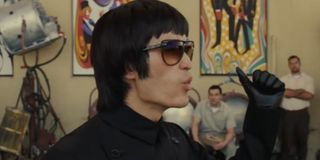Once Upon A Time In Hollywood Bruce Lee clinches his fist as he talks