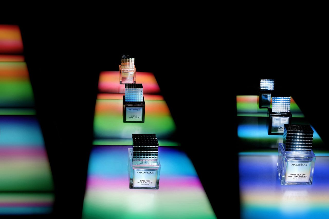 Discothèque perfume bottles on a light up dance floor