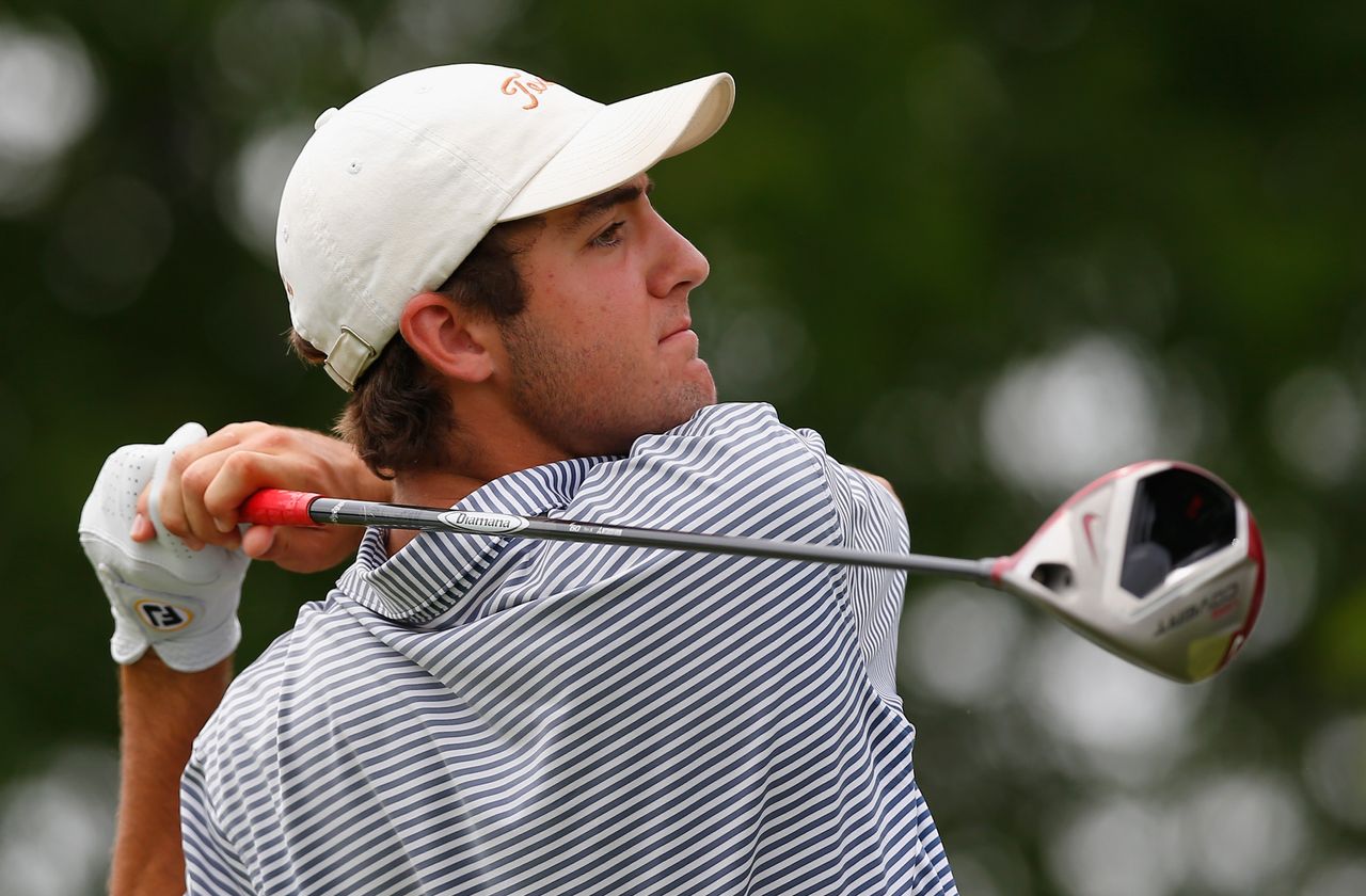 Scottie Scheffler hits a driver off the tee