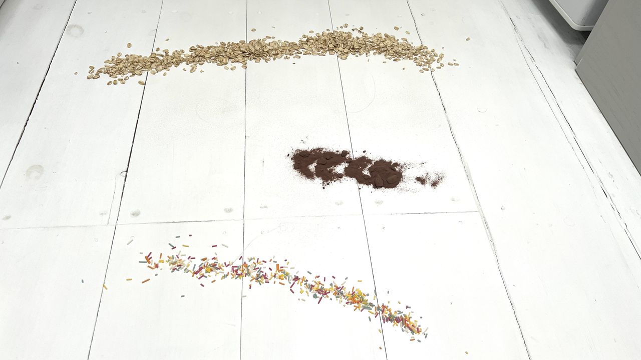 Pictured: Oats, caster sugar (not visible), cocoa powder and sprinkles.
