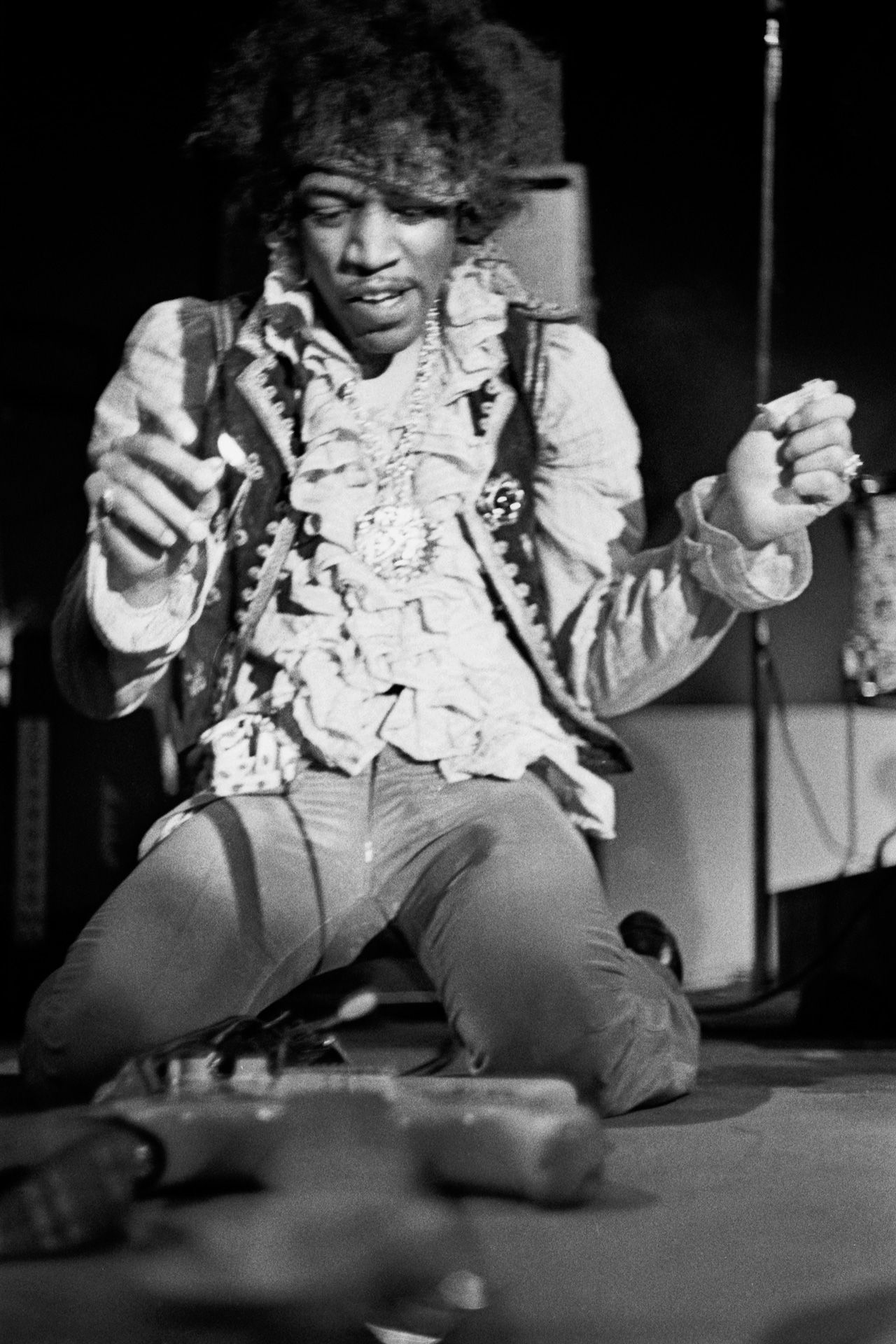 Jimi Hendrix sets fire to his guitar...