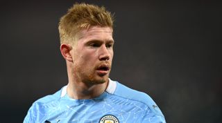 MANCHESTER, ENGLAND - JANUARY 06: Kevin De Bruyne of Manchester City looks on during the Carabao Cup Semi Final match between Manchester United and Manchester City at Old Trafford on January 06, 2021 in Manchester, England. (Photo by Shaun Botterill/Getty Images)