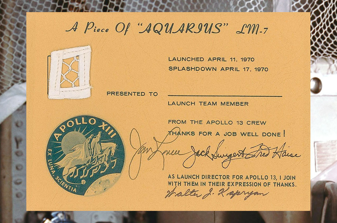 A segment of netting removed from the Apollo 13 lunar module and mounted post-flight for presentation by the crew as a souvenir of their April 1970 moon mission.