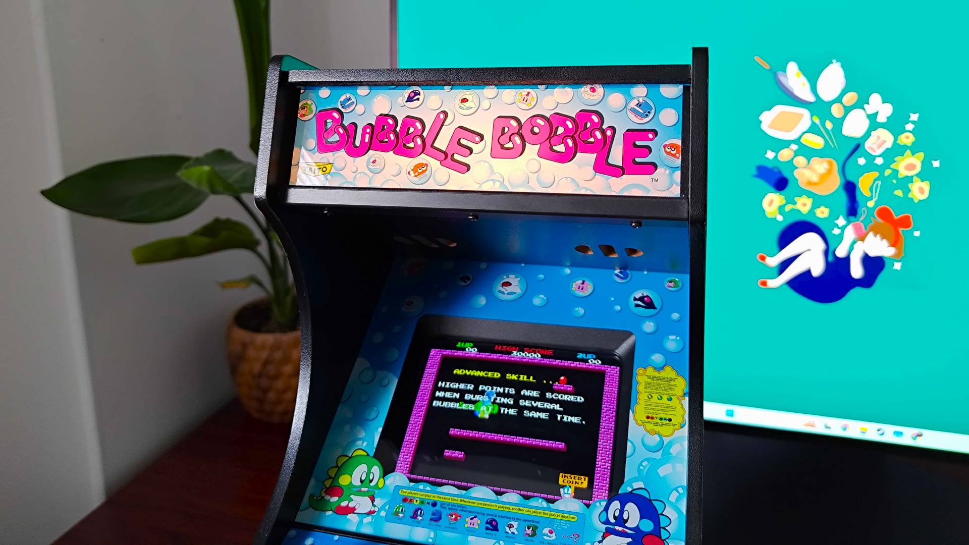 Quarter Arcades Bubble Bobble machine with view of top illuminated marquee.