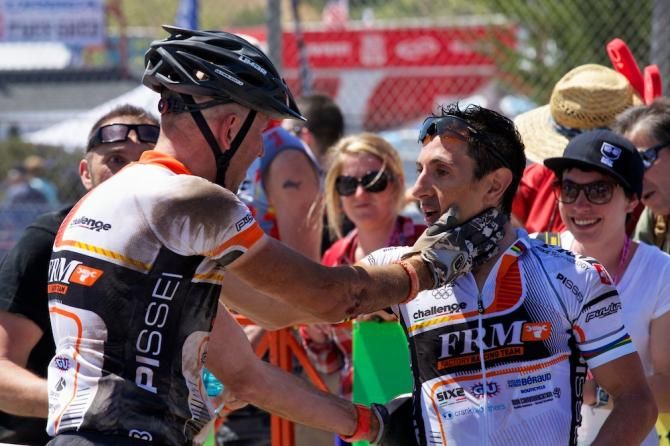 Miguel Martinez (FRM) gets a heartfelt congratulations from teammate Mirko Pirazzoli.
