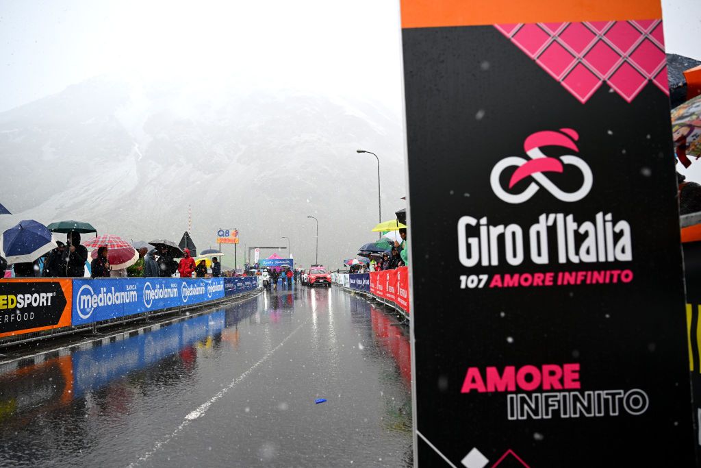 PRATO DI STELVIO ITALY MAY 21 Rain and snow at start line prior to the 107th Giro dItalia 2024 Stage 16 a 206km stage from Prato di Stelvio to Santa Cristina Valgardena Monte Pana 1625m UCIWT on May 21 2024 in Prato di Stelvio Italy Photo by Tim de WaeleGetty Images