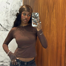 Shei Mamona wearinf a silk scarf