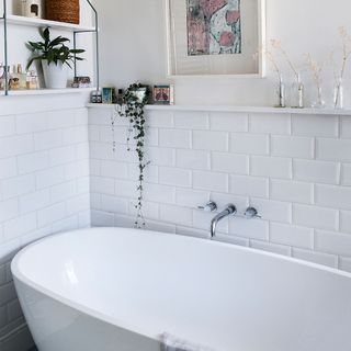 white bathroom with freestanding bath