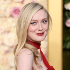 Dakota Fanning wears a red dress