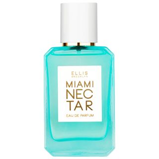 Miami Nectar Eau De Parfum in bright blue geometric shaped bottle with white and gold label and a white circular cap on white background 