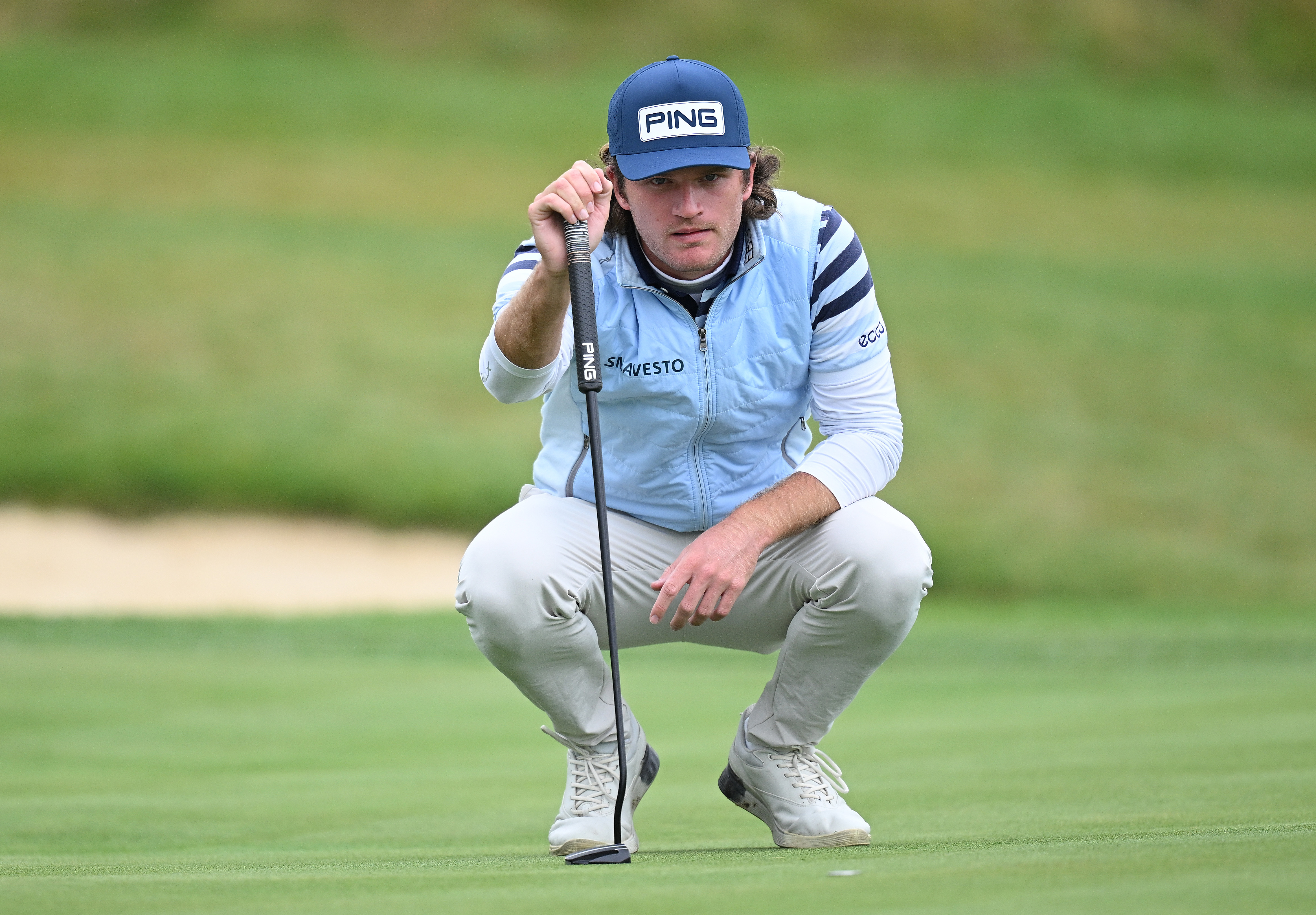 Freddy Schott lines up a putt