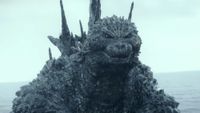 The more beastly, bumpy, dark grey design of Godzilla in Godzilla Minus One.