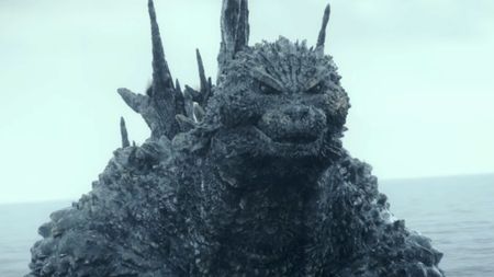 The more beastly, bumpy, dark grey design of Godzilla in Godzilla Minus One.