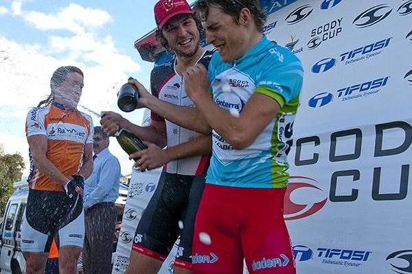 (l-r): Shane Archbold (2nd,Rabodirect New Zealand), Michael Freiberg (1st,V Australia), and Adam Phelan (3rd,Drapac Porsche) go for it on the podium in Rochester.