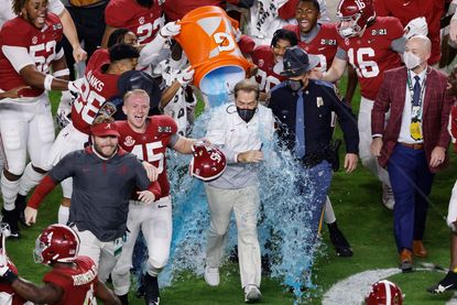 Nick Saban is dunked after record seventh national title