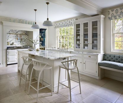White kitchen with interest: White kitchen island, kitchen cabinet, Aga