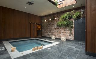 Onsen spa with red brick wall