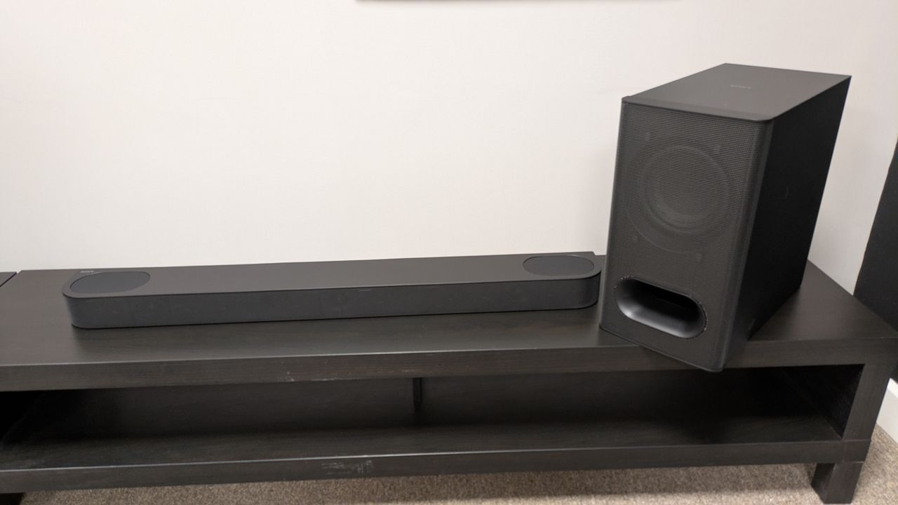 Sony Bravia Theater Bar 6 on dark wood stand